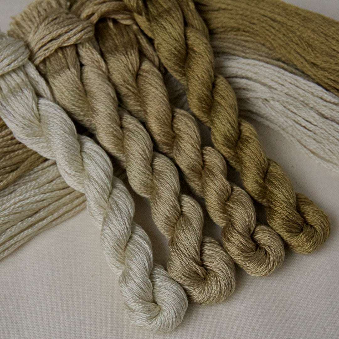 An embroidery thread gradient pack in the colour Khaki, with shades from pale to dark. From Cottage Garden Threads.