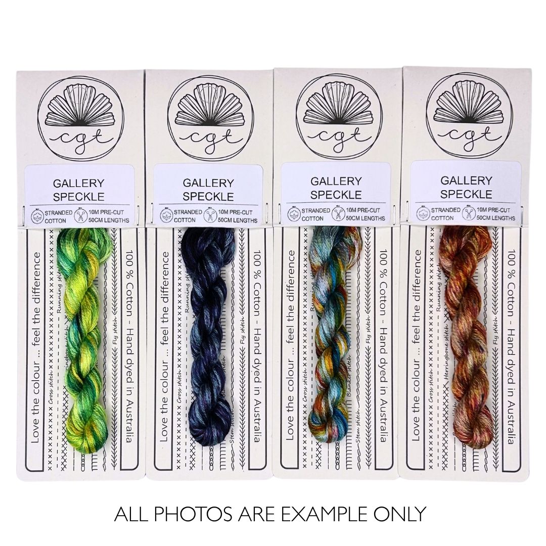 Embroidery Threads with speckle effect in lime green and yellow, indigo, earthy neutrals mixed with jewel tones and russet browns.
