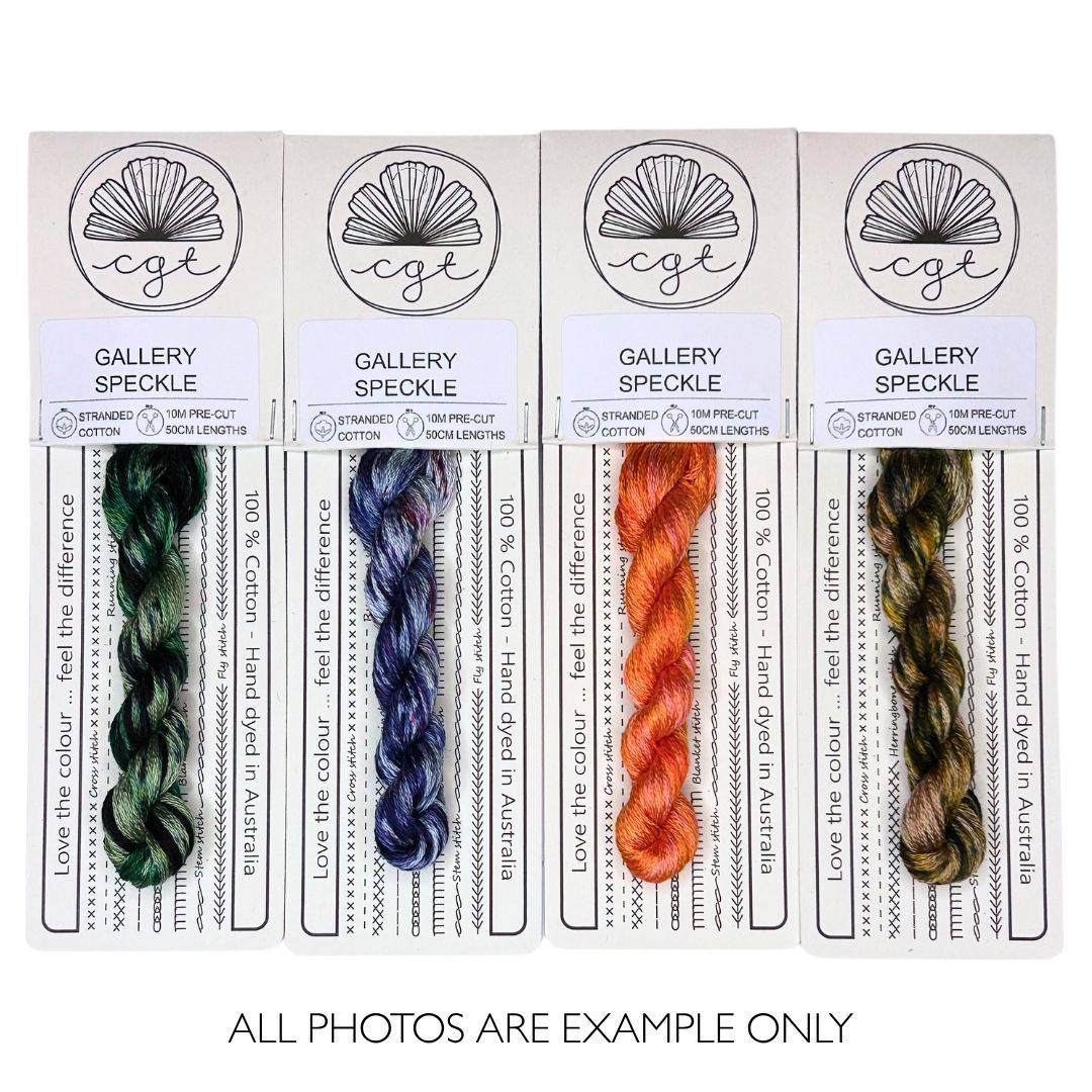 Embroidery Thread in speckle effect in forest greens, royal purple and blue, vibrant orange and mushroom browns.