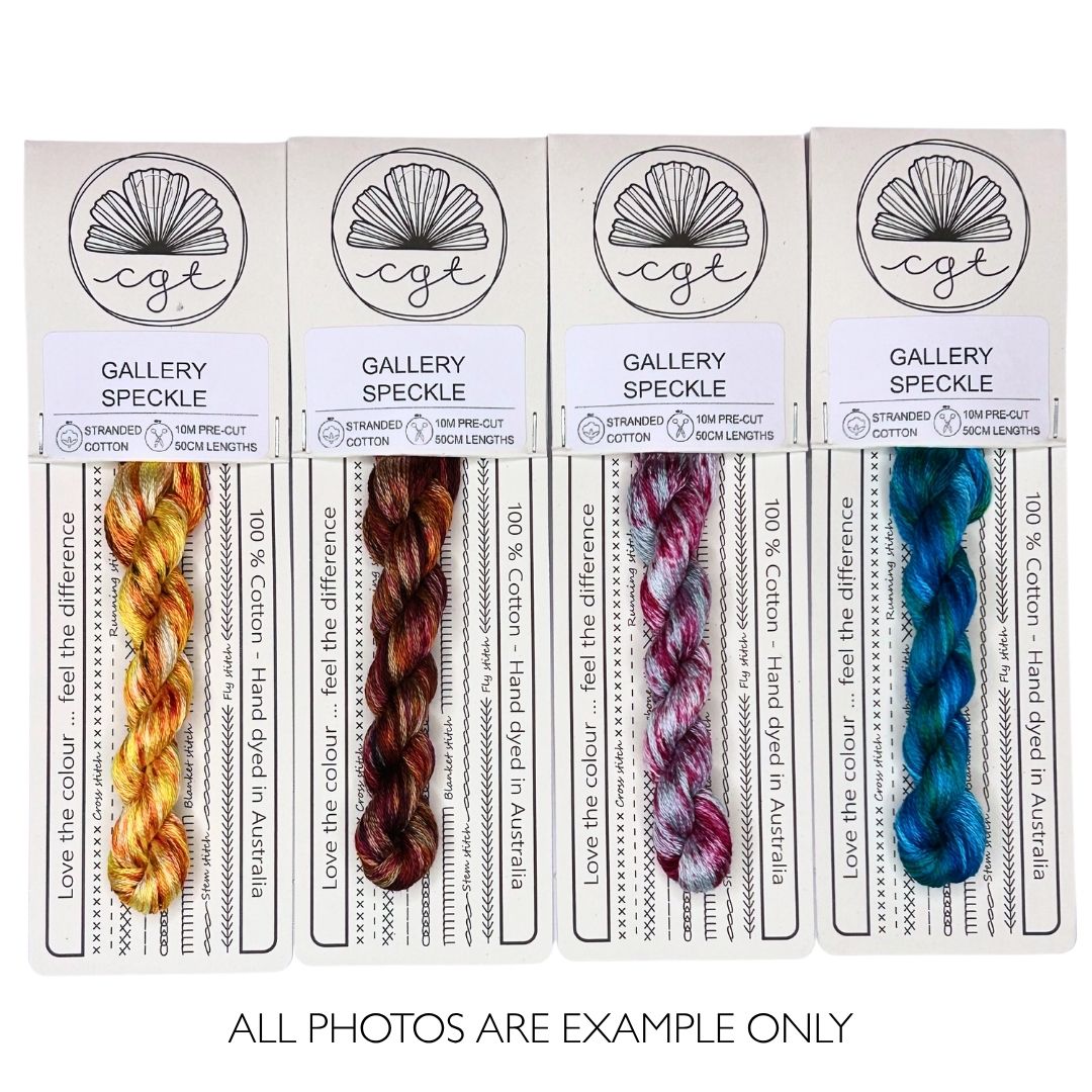 Embroidery thread with speckle effect in autumnal yellows and browns, fall russet reds, maroon and blue, ocean aqua and blue.
