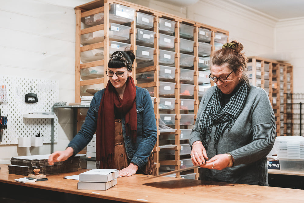 Photo of Katie and Pam Packing Threads