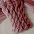 An embroidery thread gradient pack in the colour Mulberry, with shades from pale to dark. From Cottage Garden Threads.