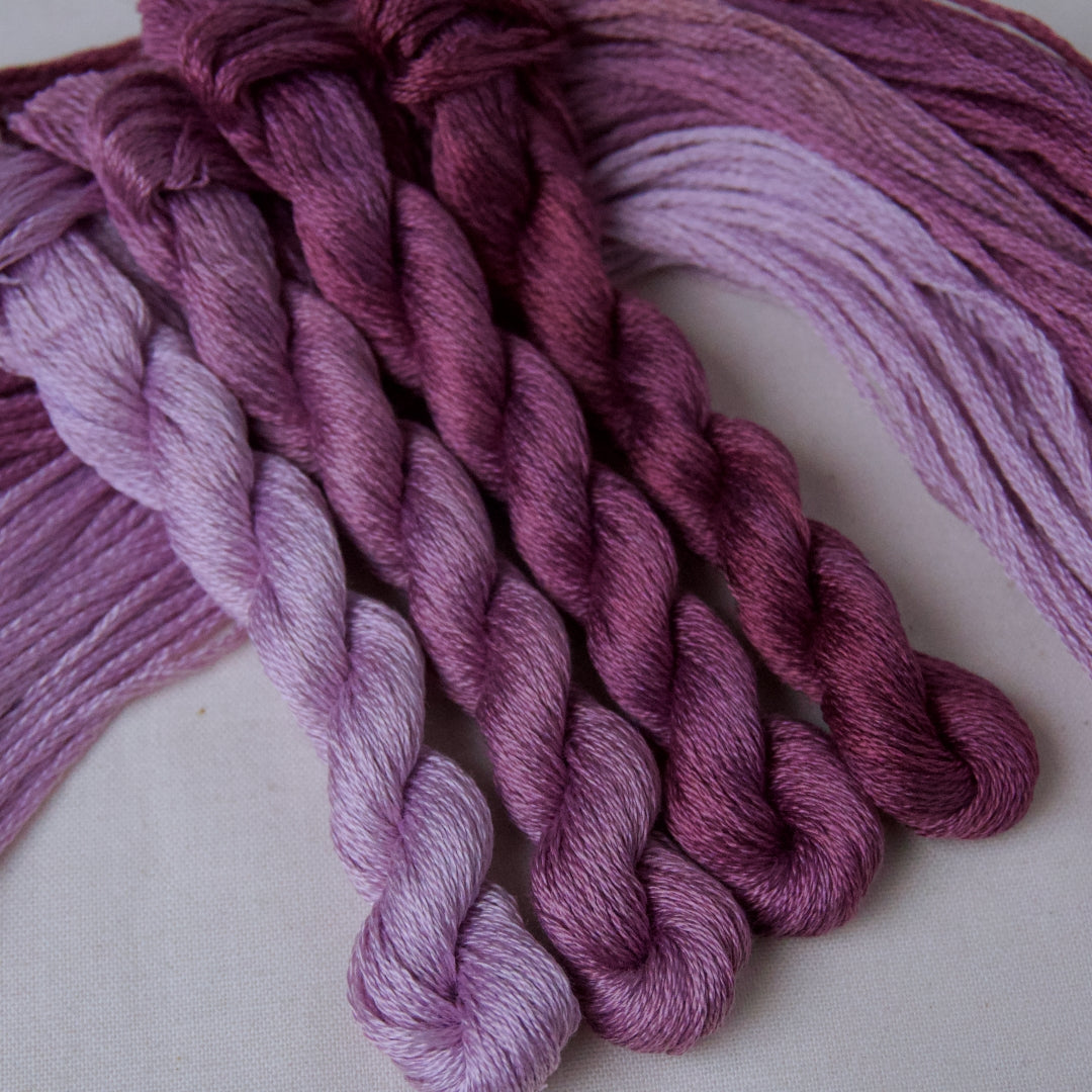An embroidery thread gradient pack in the colour Violet, with shades from pale to dark. From Cottage Garden Threads.