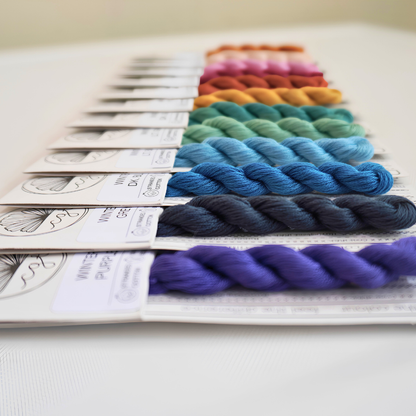 side view of winter range rainbow embroidery threads